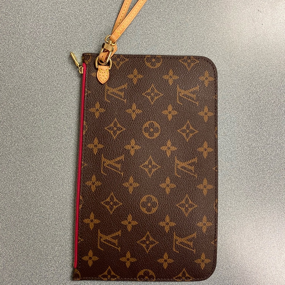 Louis Vuitton wristlet, like new never used